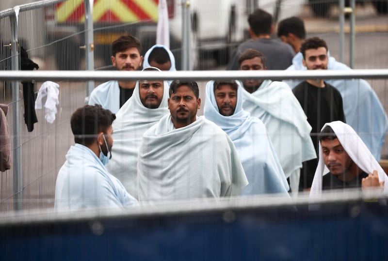 People inside a UK migrant processing centre in Manston, England. Reuters