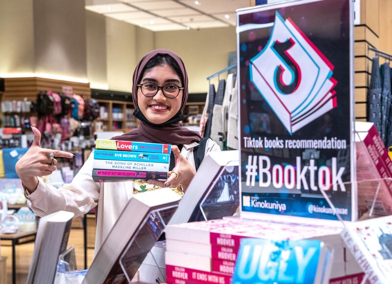 Lubna's choice of TikTok recommended books at Kinokuniya Abu Dhabi. Victor Besa / The National