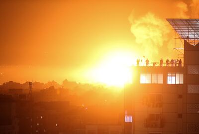 Flames and smoke rise after an Israeli air strike in Gaza in April. EPA