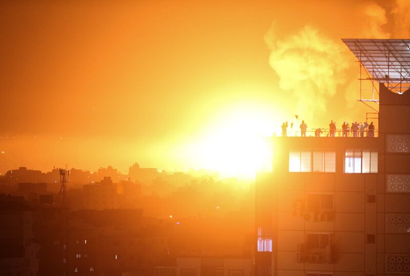 Flames and smoke rise after Israel bombarded south Lebanon and Gaza in the early hours of Friday. EPA
