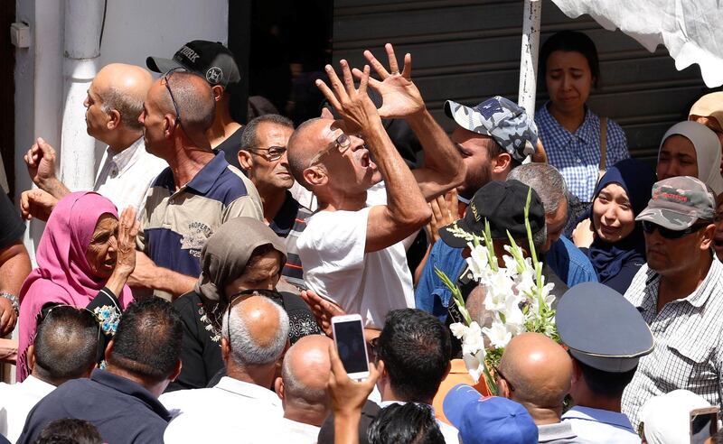 A man mourns Anis El Werghi during his funeral in Tunis on July 9, 2018. The Tunisian security forces member was killed in an ambush near the border with Algeria earlier in the week . Reuters