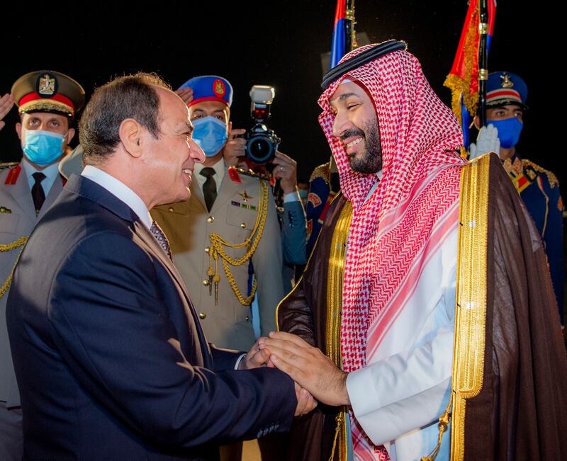 Saudi Crown Prince Mohammed bin Salman, right, is greeted by Egypt’s President Abdel Fattah El Sisi in Cairo. AP