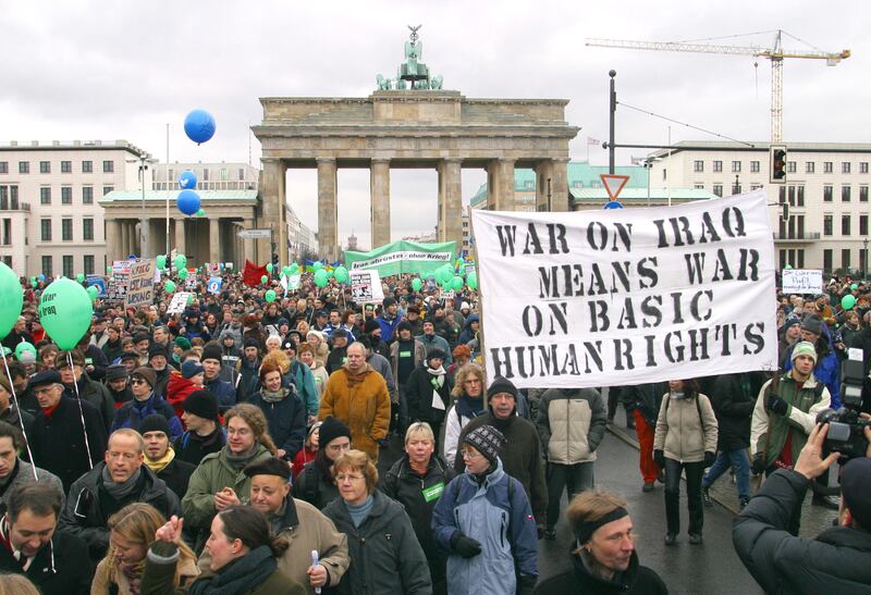 Protesters at the Brandenburg Gate in Berlin, demonstrating against war in Iraq, on February 15, 2003 - the day that saw peace demonstrations around the world. All photos: Getty Images