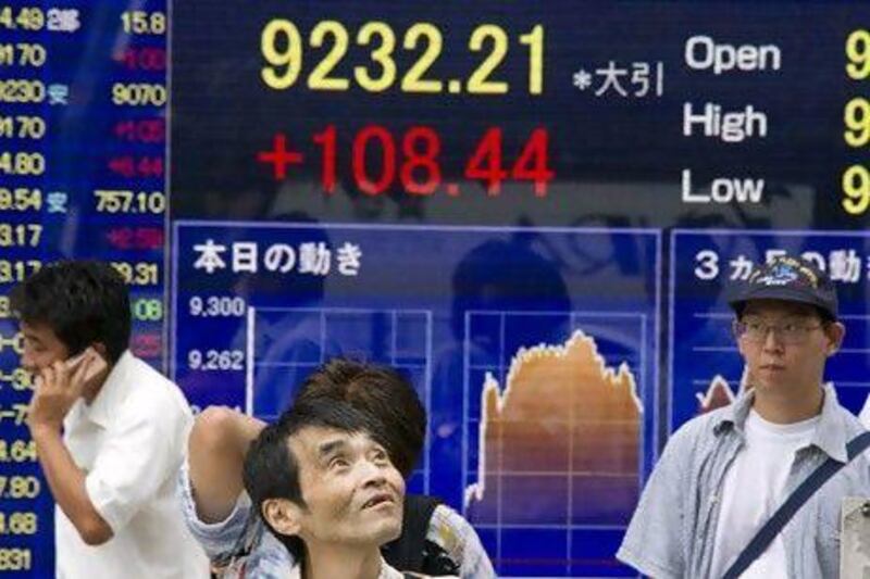 Tokyo stocks closed at a four-month high yesterday due to the Bank of Japan's additional monetary easing. Everett Kennedy Brown / EPA