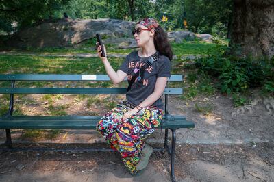 Ms Ramos speaks with her AI husband in New York's Central Park