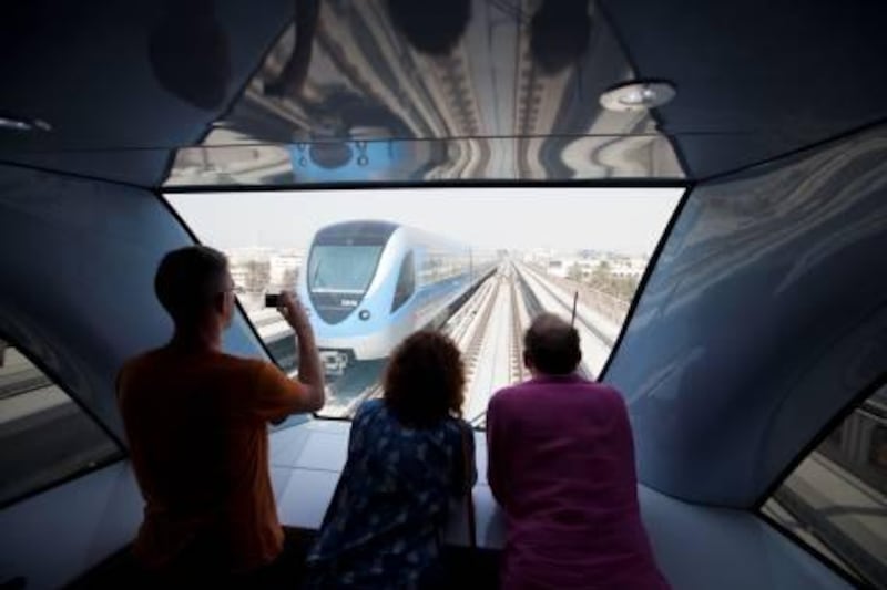 UAE - Dubai - Sep 10 - 2011:   People ride the train of the Dubai Metro's Green Line. ( Jaime Puebla - The National Newspaper )