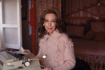 American businesswoman Helen Gurley Brown sits at the typewriter in her apartment on Central Park West, New York, New York, January 1979. Brown is the author of the best-selling book 'Sex and the Single Girl' and editor-in-chief of 'Cosmopolitan.' (Photo by Susan Wood/Getty Images)