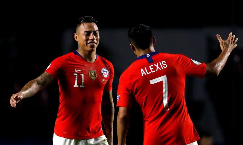 Eduardo Vargas, left, and Alexis Sanchez of Chile celebrate after the former scored his second goal of the match to become Chile's all-time leading scorer at the Copa America with 12 goals. EPA