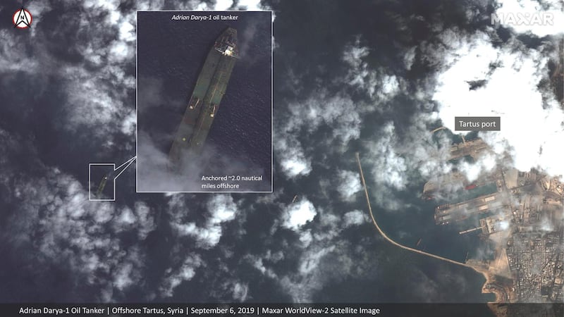 This Friday, Sept. 6, 2019, satellite image provided by Maxar Technologies appears to show the Iranian oil tanker Adrian Darya-1 off the coast of Tartus, Syria. Satellite images obtained by The Associated Press on Saturday, Sept. 7, 2019, appeared to show the once-detained Iranian oil tanker Adrian Darya-1 near the Syrian port, despite U.S. efforts to seize the vessel. That's after Gibraltar earlier seized and held the tanker for weeks, later releasing it after authorities there said Iran promised the oil wouldn't go to Syria. (Satellite image Â©2019 Maxar Technologies via AP)