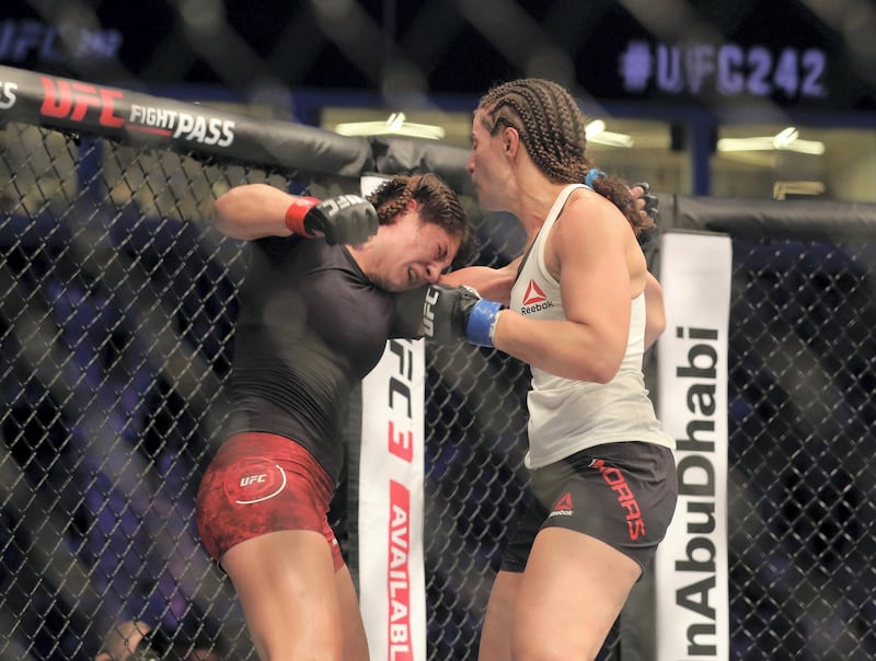 Abu Dhabi, United Arab Emirates - September 07, 2019: Women's bantamweight bout between Sarah Moras (black shorts, winner) and Liana Jojua in the Prelims at UFC 242. Saturday the 7th of September 2019. Yas Island, Abu Dhabi. Chris Whiteoak / The National