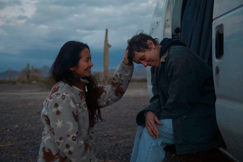 FILE - In this file photo, Director Chloe Zhao, left, appears with actress Frances McDormand on the set of "Nomadland."  â€œNomadlandâ€ has won four prizes, including best picture, at the British Academy Film Awards on Sunday, April 11, 2021. The filmâ€™s director, Chloe Zhao, became only the second woman to win the best director trophy, and star Frances McDormand was named best actress. â€œNomadlandâ€ also took the cinematography prize on Sunday. Emerald Fennellâ€™s revenge comedy â€œPromising Young Womanâ€ was named best British film, while the best actor trophy went to 83-year-old Anthony Hopkins for playing a man grappling with dementia in â€œThe Father.â€ An event that was criticized in the recent past with the label #BAFTAsSoWhite rewarded a diverse group of talents, during a pandemic-curbed ceremony at Londonâ€™s Royal Albert Hall. (Searchlight Pictures via AP, FIle)