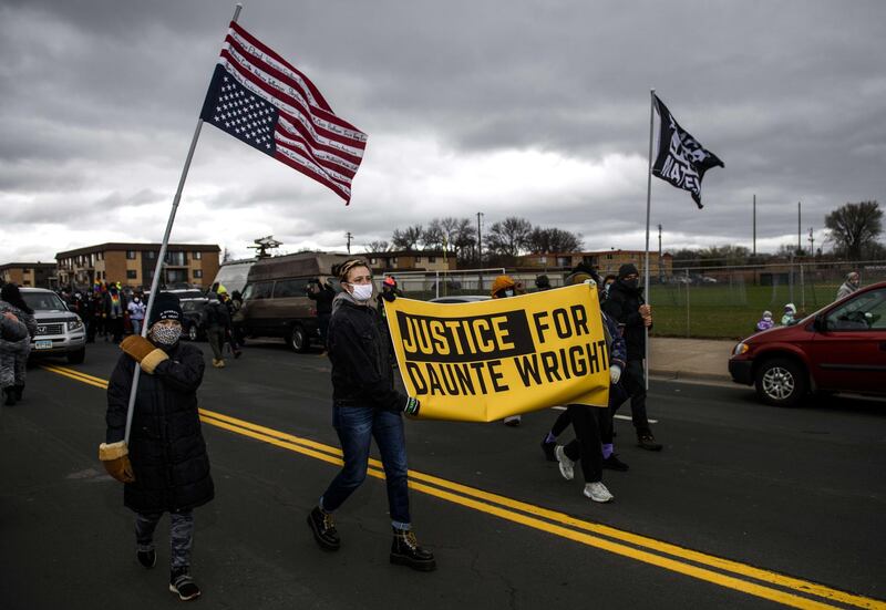 BROOKLYN CENTER, MN - APRIL 13: Protesters march from the Brooklyn Center police headquarters to a nearby FBI office on April 13, 2021 in Brooklyn Center, Minnesota. Demonstrations have become a daily occurrence since Daunte Wright, 20, was shot and killed by Brooklyn Center police officer Kimberly Potter on Sunday. Photo by Stephen Maturen/Getty Images)
== FOR NEWSPAPERS, INTERNET, TELCOS & TELEVISION USE ONLY ==
