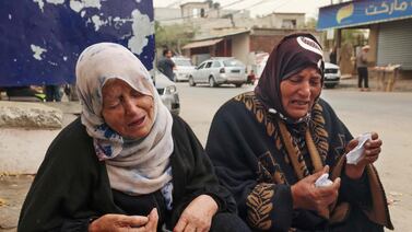 Palestinian women mourn the death of loved ones outside Al Najjar hospital following overnight Israeli bombardment in Rafah in the southern Gaza Strip, amid the continuing conflict between Israel and Hamas on April 18, 2024. AFP