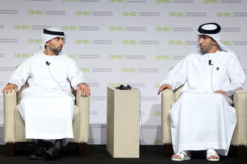 Suhail Al Mazrouei, the Minister of Energy, left, and Thani Al Zeyoudi, the Minister of Climate Change and Environmentat a panel at the Global Manufacturing and Industrialisation Summit at Paris-Sorbonne University in Abu Dhabi. Delores Johnson / The National