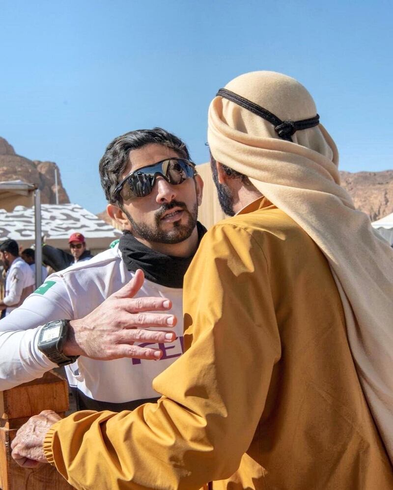 Sheikh Hamdan greeted by his father Sheikh Mohammed bin Rashid. Twitter/ @HamdanMohammed