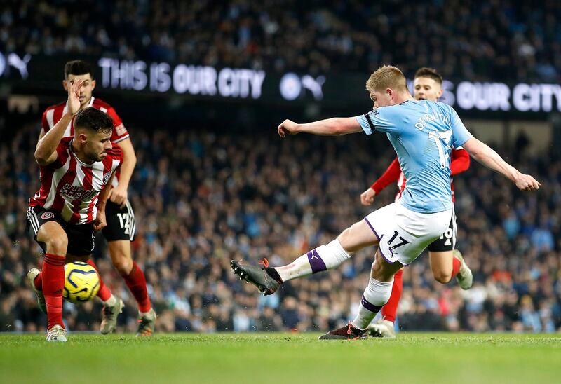 Manchester City's Kevin De Bruyne (right) scores his side's second goal of the game during the Premier League match at The Etihad Stadium, Manchester. PA Photo. Picture date: Sunday December 29, 2019. See PA story SOCCER Man City. Photo credit should read: Martin Rickett/PA Wire. RESTRICTIONS: EDITORIAL USE ONLY No use with unauthorised audio, video, data, fixture lists, club/league logos or "live" services. Online in-match use limited to 120 images, no video emulation. No use in betting, games or single club/league/player publications.