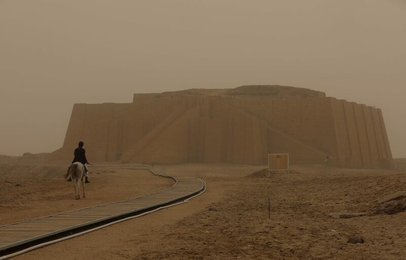 A dust storm engulfs the Great Ziggurat temple in the ancient city of Ur in Iraq's southern province of Dhi Qar, near Nasiriyah. AFP