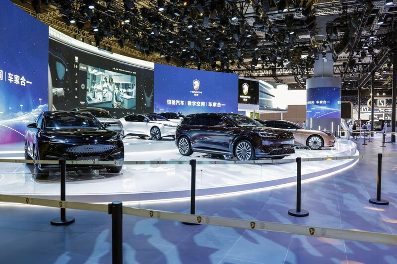 China Evergrande New Energy Vehicle Group's Hengchi electric vehicles at the Auto Shanghai 2021 show in Shanghai, China. The financial crisis of the Evergrande parent company is said to have stopped Evergrande NEV from paying staff and factory suppliers. Bloomberg