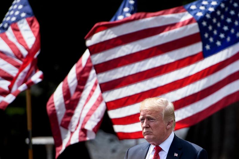 (FILES) In this file photo taken on June 5, 2018 US President Donald Trump leaves after the "Celebration of America" at the White House in Washington, DC. Trump announced on June 15, 2018 a series of tariffs of 25 percent targeting $50 billion in Chinese imports from "industrially significant" technologies, making good on a pledge to punish the alleged theft of American intellectual property. In a statement, Trump also warned of "additional tariffs" should China retaliate with countermeasures on American goods and services exports.
 / AFP / Brendan Smialowski
