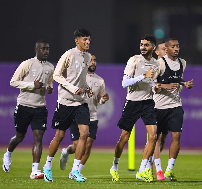 Players take part in a warm-up in training ahead of their upcoming 2026 World Cup qualifier against Yemen.