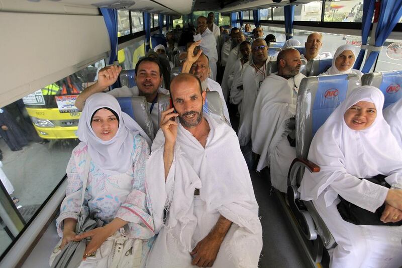 Egyptian pilgrims chant as they ride a bus from Mecca to Mount Arafat yesterday. Amr Nabil / AP Photo