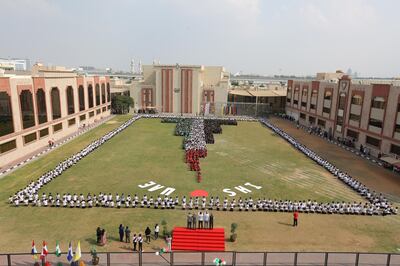 Almost 2,500 pupils of The Indian High Group of Schools outline Burj Khalifa in the colours of the UAE flag. Photo: The Indian High Group of Schools