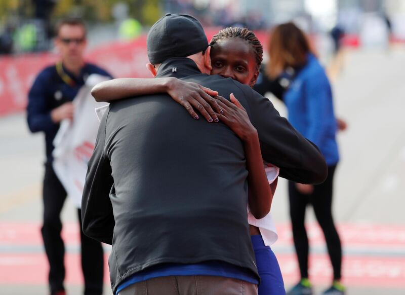 Kenya's Brigid Kosgei celebrates setting a new world record to win the Chicago women's marathon. Reuters