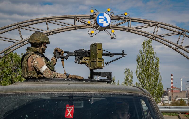 A Russian serviceman stands guard in front of the Zaporizhzhia Nuclear Power Station in Enerhodar, south-eastern Ukraine. EPA