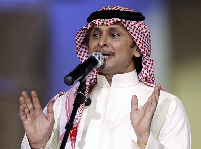 Saudi Arabia's singer Abdul Majeed Abdullah performs on the second night of Qatar's Song Festival in Doha January 11, 2007. The festival features several Arab pop stars and classical singers, including Iraq 's top singer Kazem Al-Saher, Lebanese singer Najwa Karam and Saudi Arabia's Mohammed Abdo.  REUTERS/Fadi Al-Assaad (QATAR)