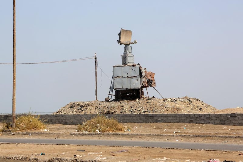 A destroyed vehicle with a radar antenna is pictured on Yemen's south-west coast on October 13, 2016. It is unclear if it was the target of US bombing of coastal radar sites in Houthi-held territory. AFP

