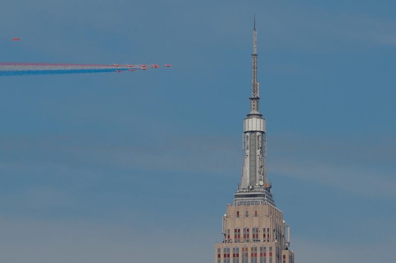 The Royal Air Force Red Arrows from the United Kingdom fly past the Empire State Building in New York, U.S.   Reuters