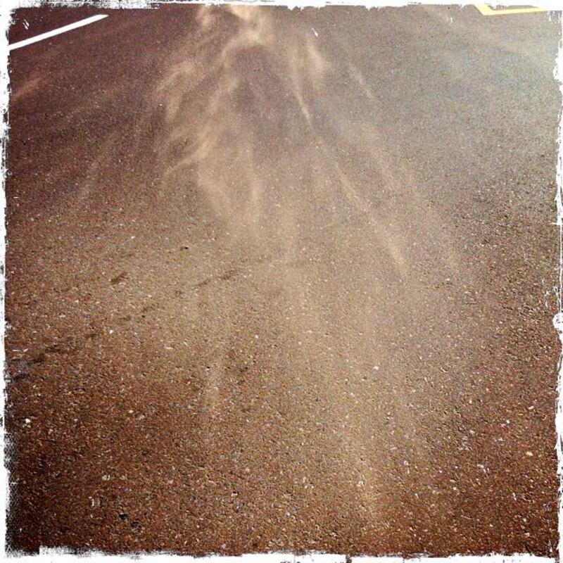Day trip with friends to the Western Region and the Mazayin Dhafra Camel Festival, 220 kms west of Abu Dhabi on December 20, 2013. Sand blew across the pavement during a sandstorm.  Picture taken with the Hipstamatic app for the iPhone. Liz Claus / The National