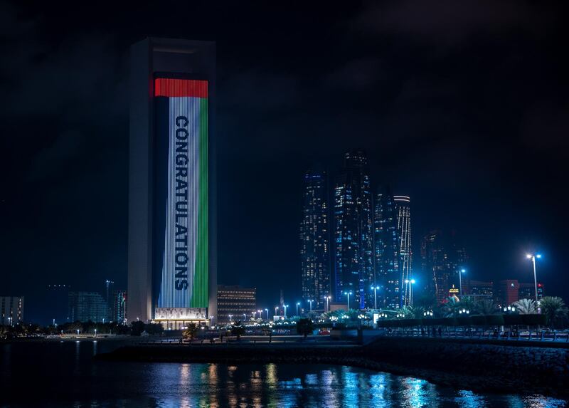 Abu Dhabi, United Arab Emirates, February 9, 2021.  The ADNOC Headquarters lights up to celebrate the success of the Hope probe going into orbit around Mars.  
Victor Besa/The National
Section:  NA