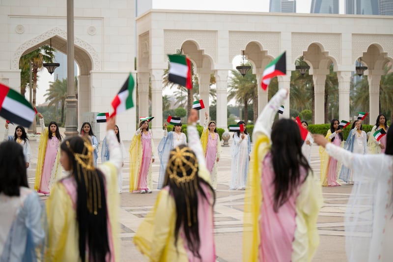 Schoolchildren participate in the state visit reception hosted for Sheikh Meshal. Omar Askar /  UAE Presidential Court