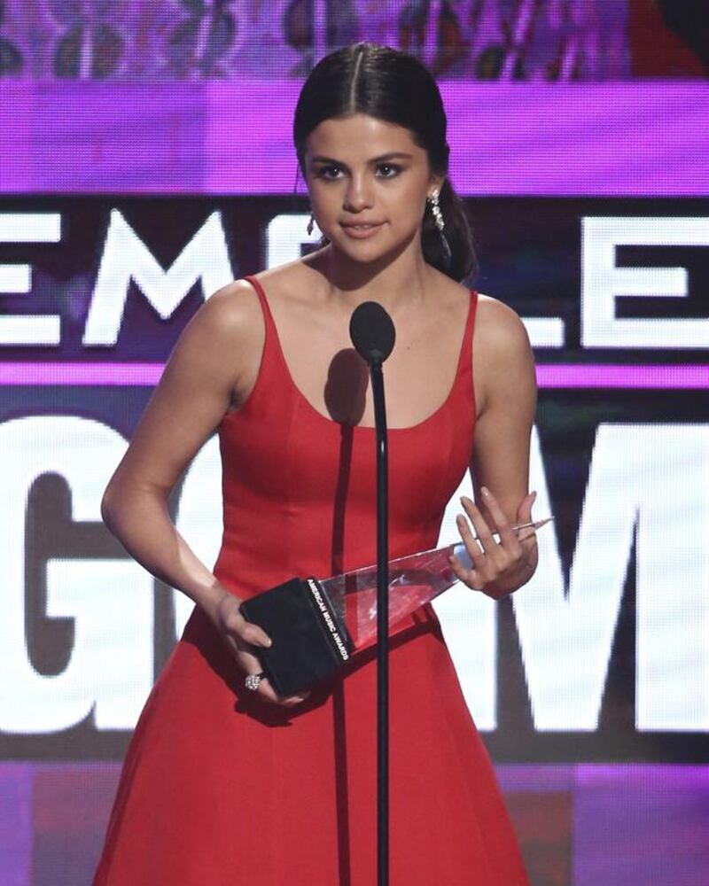 Selena Gomez accept the award favorite female artist pop/rock at the American Music Awards at the Microsoft Theater on Sunday, Nov. 20, 2016, in Los Angeles. (Photo by Matt Sayles/Invision/AP)