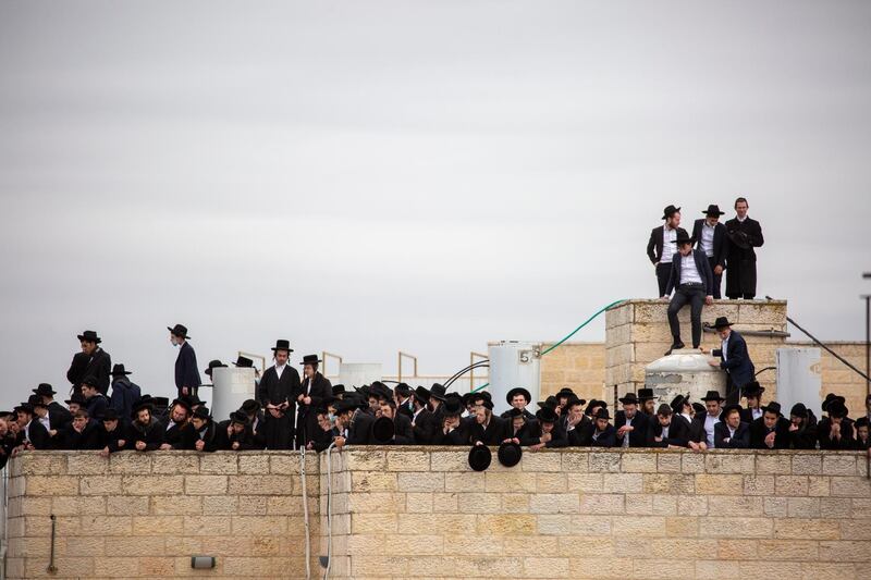 Ultra-Orthodox Jews participate in the funeral for Rabbi Meshulam Dovid Soloveitchik in Jerusalem. AP