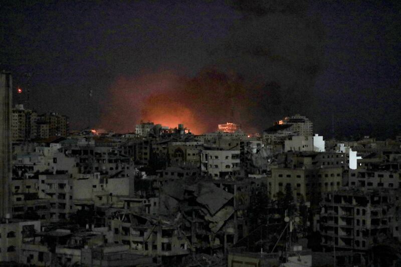 A fire burns in western Gaza after an Israeli air strike. Reuters