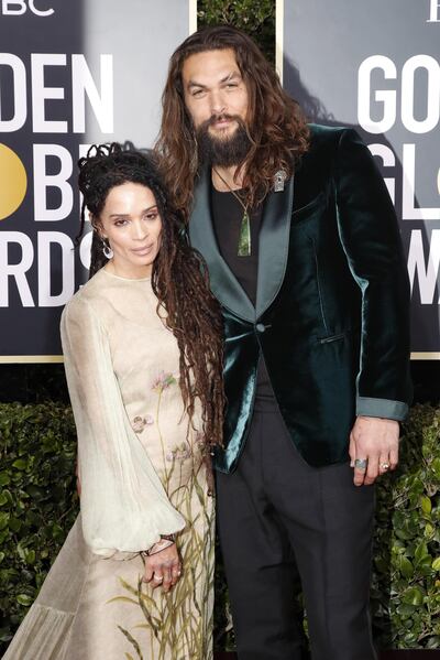 epa08106145 Jason Momoa and Lisa Bonet arrive for the 77th annual Golden Globe Awards ceremony at the Beverly Hilton Hotel, in Beverly Hills, California, USA, 05 January 2020.  EPA/NINA PROMMER