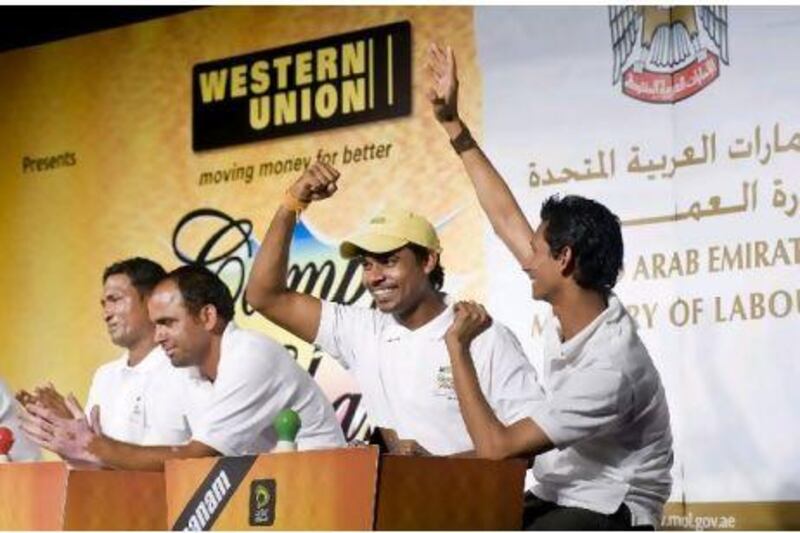 Chandrama Shah and Moin Khan, celebrate winning the Western Union Camp Ka Champ contest.