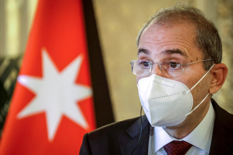 Jordan's Minister of Foreign Affairs Ayman Safadi, wearing a protective mask, attends a joint press conference following a meeting on the Middle East Peace process, in Paris. Reuters