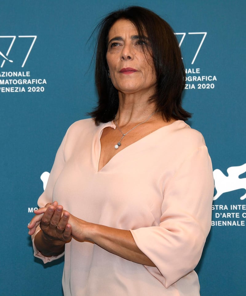 epa08645482 Actress Hiam Abbas poses at a photocall for 'Gaza Mon Amour ' at the 77th Venice International Film Festival on September 4, 2020. EPA