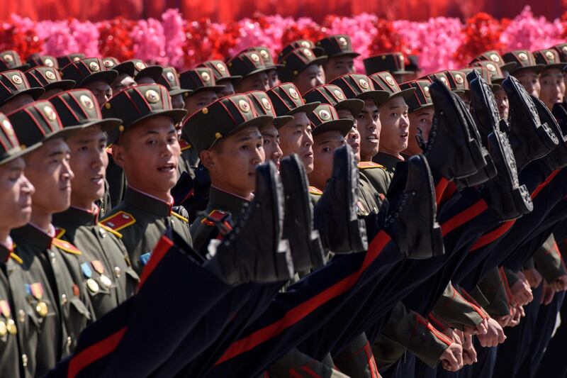 Korean People's Army (KPA) soldiers march during a mass rally on Kim Il Sung square in Pyongyang.  AFP