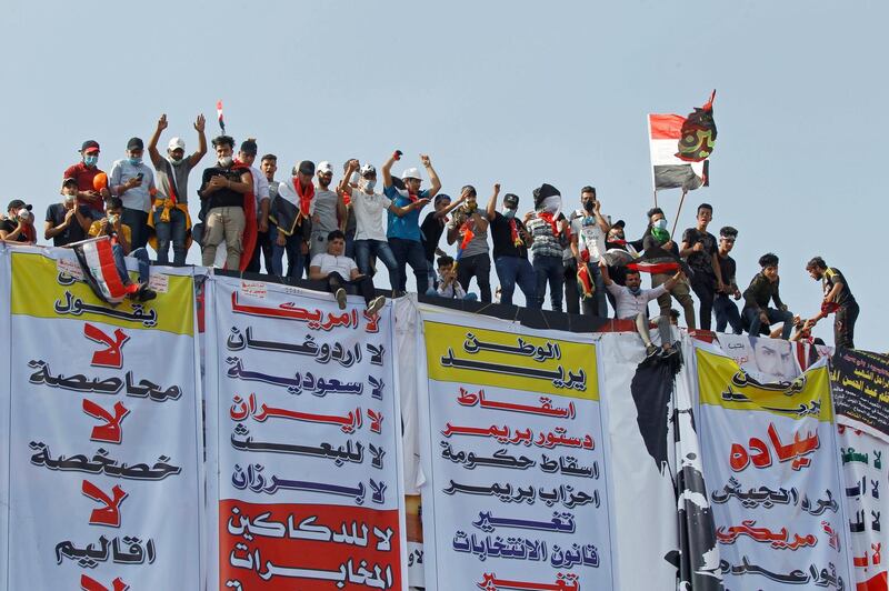 Demonstrators take part in anti-government protests in Baghdad. Reuters