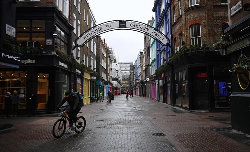 epa09016476 A deserted Carnaby in London, Britain, 16 February 2021. The UK government is preparing to announce the lifting of third UK lockdown. British Prime Minister Boris Johnson is set to deliver a speech 22 February to outline the easing of lockdown restrictions.  EPA/ANDY RAIN