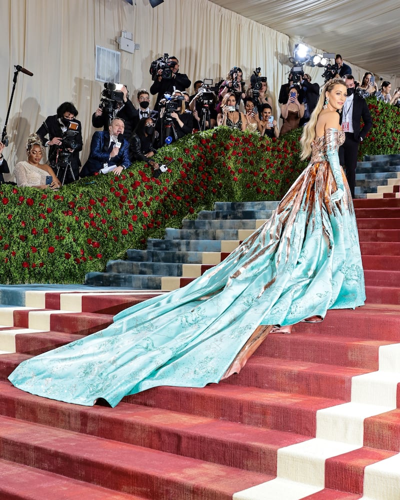 Blake Lively in a colour-changing gown by Atelier Versace gown for the 2022 Met Gala. Getty Images 
