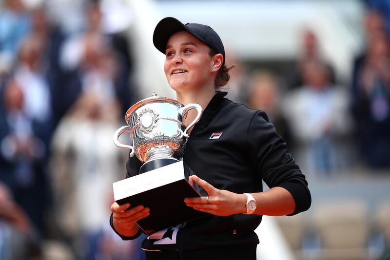 PARIS, FRANCE - JUNE 08: Ashleigh Barty of Australia celebrates victory with the trophy following the ladies singles final against Marketa Vondrousova of The Czech Republic during Day fourteen of the 2019 French Open at Roland Garros on June 08, 2019 in Paris, France. (Photo by Clive Brunskill/Getty Images)