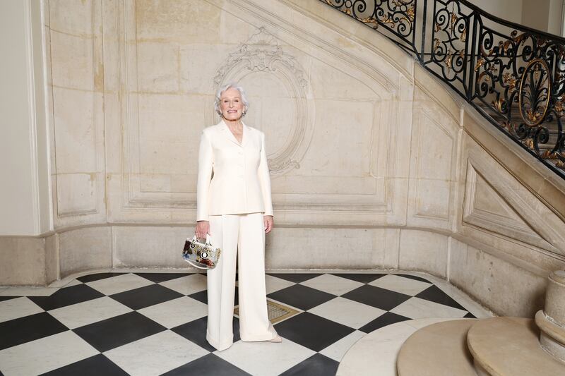 Glenn Close at the Christian Dior show wearing a Bar jacket suit in cream