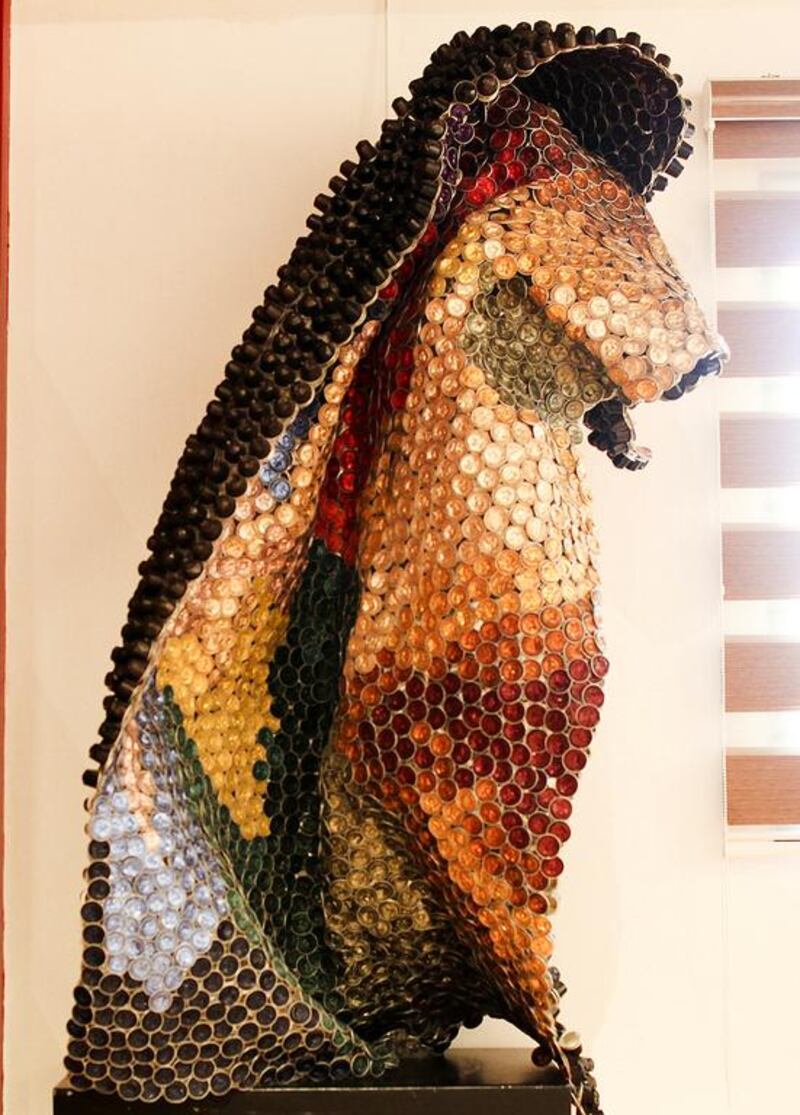 Al Ness Abaya sculpture at Etihad Modern Art Gallery is made entirely from Nespresso pods. Lee Hoagland / The National 