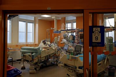 A member of the medical staff treats a patient suffering from the coronavirus disease (COVID-19) at the Intensive Care Unit (ICU) of the General University Hospital in Prague, Czech Republic, September 22, 2020. REUTERS/David W Cerny