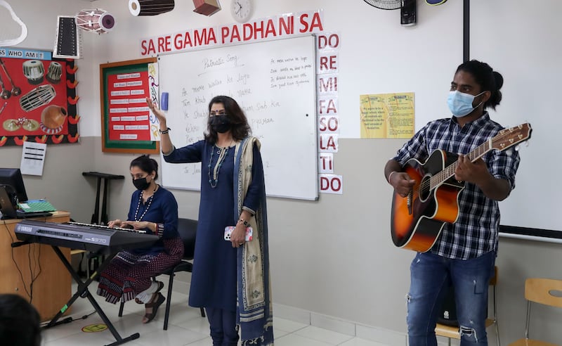 Music teachers and pupils at Delhi Private School. Khushnum Bhandari / The National